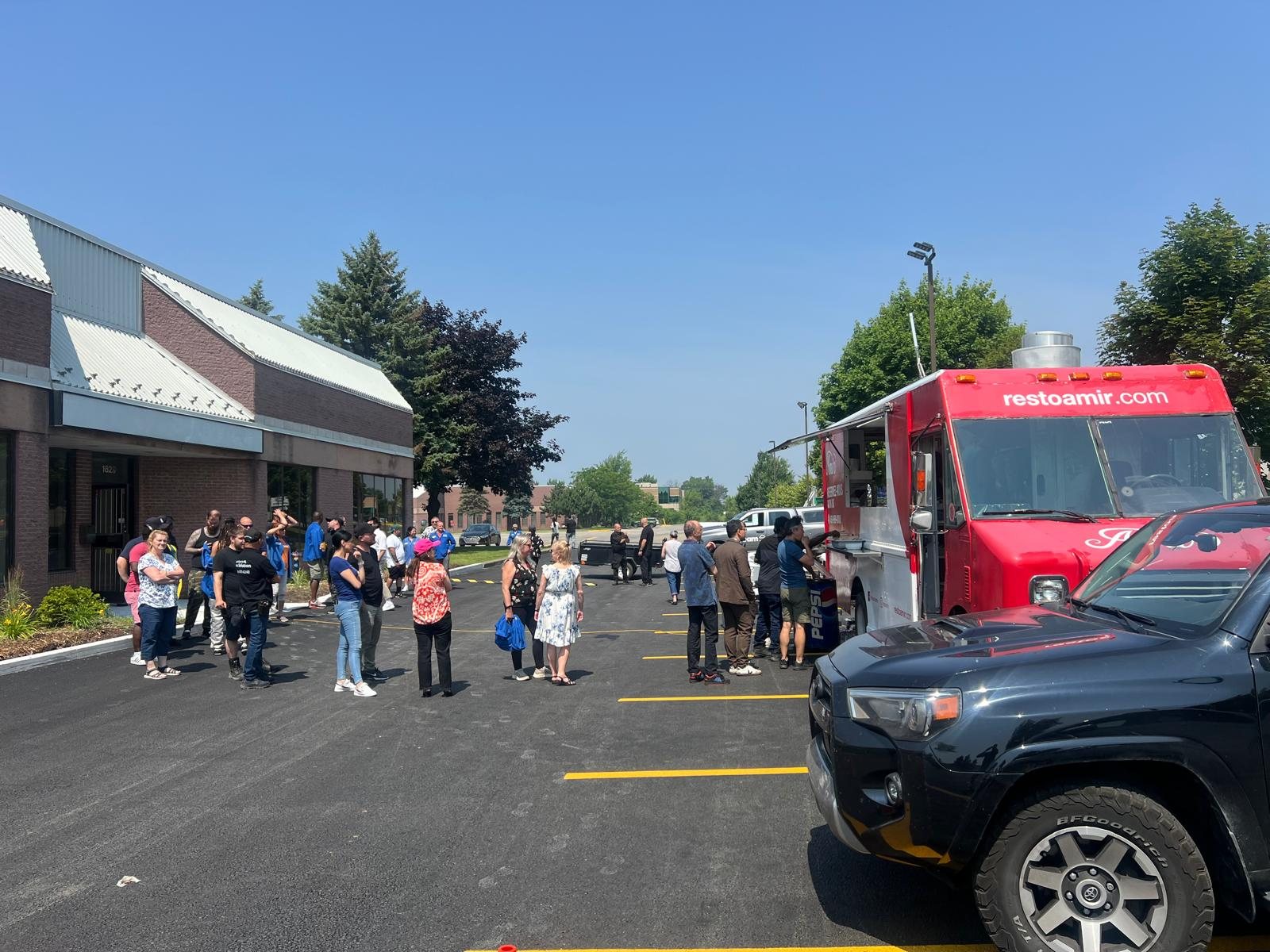 Crowd lined up at an Amir food truck